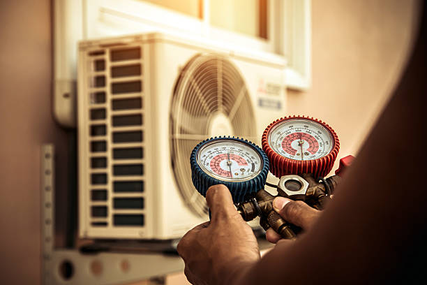 Professional Air Conditioning Service technician working in Lincoln, ND